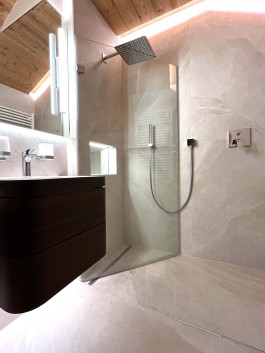 Renovated bathrooms in Parc A15 apartment, Champex-Lac by WADE Architecture, ongoing project