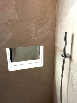 Renovated bathrooms in Parc A15 apartment, Champex-Lac by WADE Architecture, ongoing project