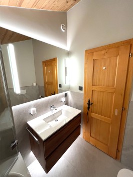 Renovated bathrooms in Parc A15 apartment, Champex-Lac by WADE Architecture, ongoing project